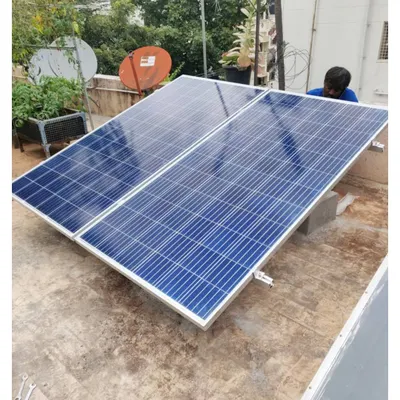 Small changes can make a big impact. This image shows a small two-panel setup on a residential terrace, which is all that's needed to power a solar-compatible UPS system.