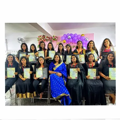 A proud moment with my students at the end of a successful hairstyling course. Each student is holding their certificate of completion, ready to start their professional journey.