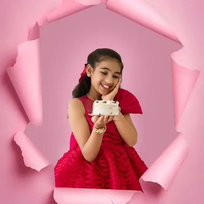 A creative and fun birthday portrait for an older child. This unique paper-tear effect adds a pop of color and personality, making her birthday photos truly one of a kind.