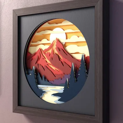 An angled view of our Sunset Over Mountain Lake 3D shadow box. This perspective highlights the depth between the foreground trees and the background mountains.