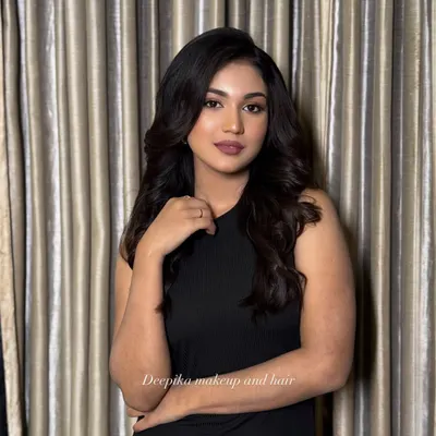 A sophisticated party look with soft, voluminous waves and a flawless matte makeup finish.