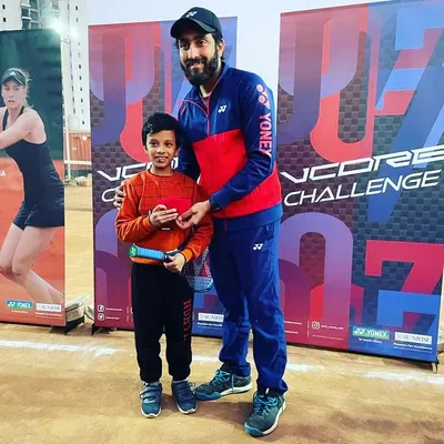 Our Head Coach with a young player during the Yonex VCORE Challenge we hosted at our academy. It was a fantastic opportunity for our students to test out the new 7th Gen racquets and experience pro level gear.