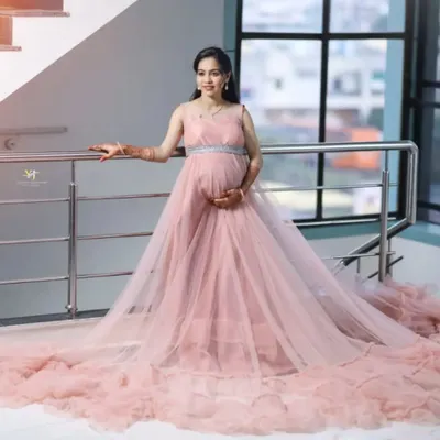 Create your own fairytale moment with this beautiful pink maternity gown featuring a long, detachable tail. My rental options start at just 499, with sizes for everyone.