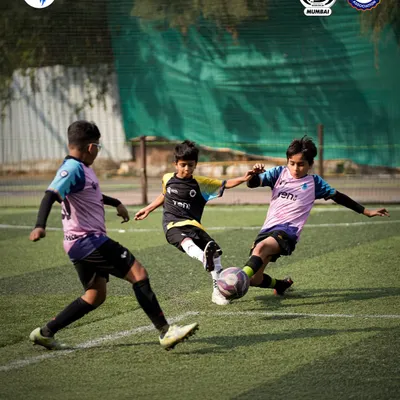 Intensity in every frame. Two players locked in a battle for the ball during an SFL Mumbai league match. This is the competitive spirit we nurture.