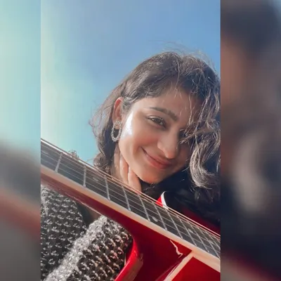 A happy selfie with my guitar. This instrument is like an extension of me, and I take it everywhere.
