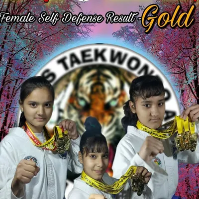My female self-defense team showcasing their Gold medals from a national competition. Their success is a huge inspiration for everyone at the academy.