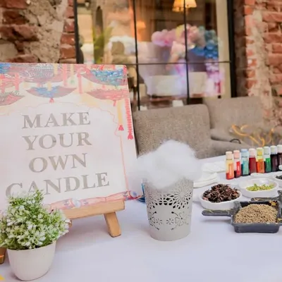 A "Make Your Own Candle" station is a wonderful way to engage guests. This setup provided a creative outlet and a personalized party favor, an idea that works beautifully for corporate wellness days or holiday parties.
