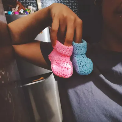 I made these tiny, soft crochet baby booties, and my heart just melted. Available in different colors, they are handmade with cozy yarn to be super gentle on a baby's feet, making them a perfect baby shower gift.