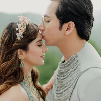 A forehead kiss is a promise. We create the space for these quiet, intimate moments, ensuring your portraits are filled with genuine emotion and love.