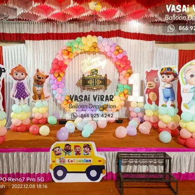 Here is another look at a full Cocomelon stage setup. We include all the main characters as cutouts, a themed bus, and a vibrant rainbow balloon arch to bring the cheerful world of Cocomelon to your party.