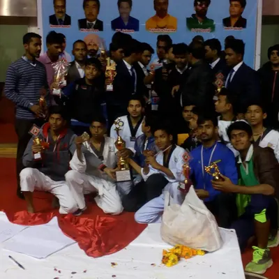Our team celebrating their victories at a national karate championship. The camaraderie and shared sense of achievement are a huge part of what we do.