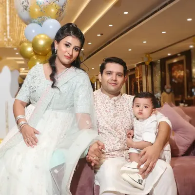 A beautifully dressed family poses for a portrait at an elegant evening event. We capture the style and atmosphere of your special gatherings.