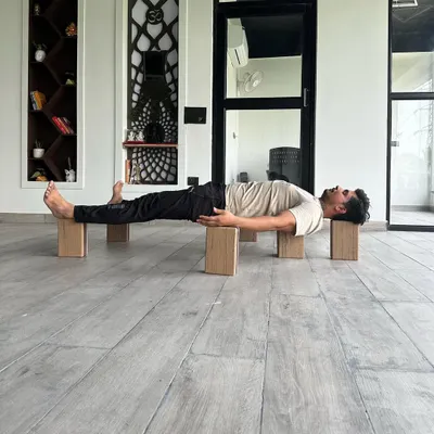 This pose, supported on blocks, is inspired by Bhishma lying on a bed of arrows. It is a powerful therapeutic asana for cardiac patients, as it opens the chest and supports the heart. This is an example of the deep, therapeutic knowledge we explore.