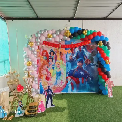 For a corporate Children's Day celebration, I designed this fun dual-themed backdrop featuring popular characters, complete with a colorful balloon arch and decorative stands for treats.