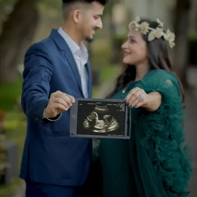 The sonogram picture is the first portrait of your baby. Including it in your maternity shoot is a beautiful and meaningful way to celebrate the new life you're creating together.
