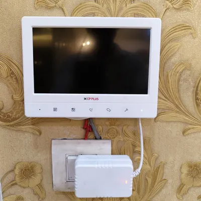 This is the main 7-inch indoor screen from CP Plus. We install it inside your home so you can clearly see who is at the door. The large, color display and easy-to-use buttons make it a RELIABLE home security solution for any family.