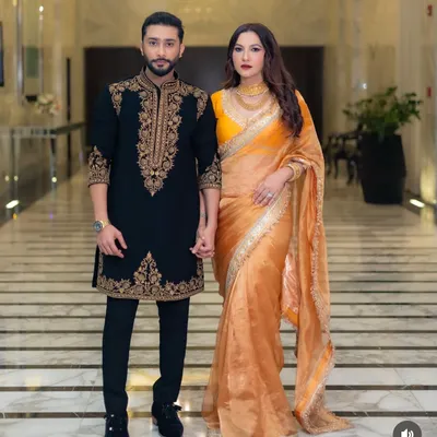The beautiful couple, Gauahar Khan and Zaid Darbar. We had the honor of designing this custom black sherwani with rich gold embroidery for Zaid, a timeless piece for his special day.
