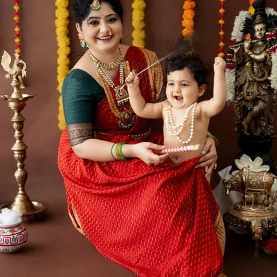 The most infectious giggle from a little Krishna during our Janmashtami festive session. Capturing these moments of pure happiness between a mother and her child is what I live for.