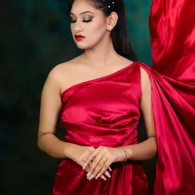 A timeless glamour look with a flowing red satin dress. Our students learn to create elegant and sophisticated styles for any high-class event.