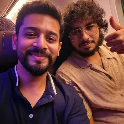 On a flight for my UK tour with fellow musician Abhed Abhisheki. Traveling for concerts is a journey of music and friendship.