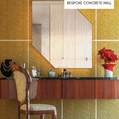A bespoke concrete wall in a vibrant yellow, herringbone pattern. This project shows how concrete can be used to create a bold, textured, and colorful statement piece in a dressing area.