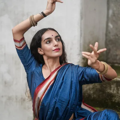 My background as a trained Bharatanatyam dancer deeply influences my understanding of yoga. The hand mudras and expressive movements are another language for connecting with the divine, reminding me that awareness, not the pose, is the goal.