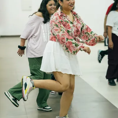 A candid moment of pure joy from one of our dance sessions. This is the feeling we strive for in every class: happiness in movement.