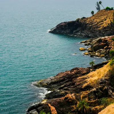 The stunning rocky coastline of Gokarna. Our beach treks take you along these scenic paths, connecting one beautiful beach to another.