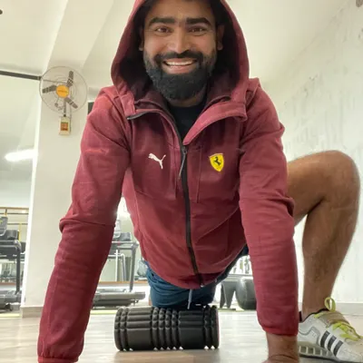 I always have work to do, and that includes recovery. Using a foam roller on my quads helps release muscle tension and improve flexibility after a tough leg workout.