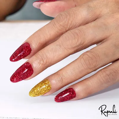 A beautiful before-and-after of a client's nails, transformed with glittery red and gold gel polish on elegant almond-shaped extensions.