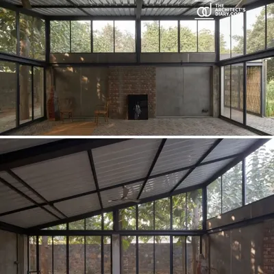 An overview of the Artist Residency in New Delhi, where glass walls and an open structure blur the lines between the living space and the natural landscape, creating a truly organic environment.