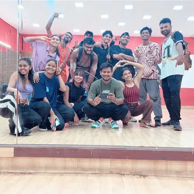 A happy team after a successful show. This group photo in our dance studio captures the energy and camaraderie of our talented choreographers and dancers.
