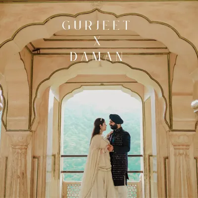 Framed by the beautiful arches of a Jaipur palace, this couple shares an intimate moment. This shot perfectly captures the royal Indian wedding aesthetic.