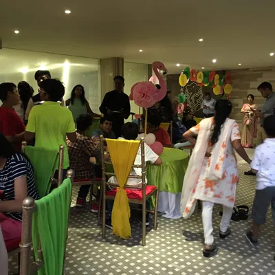 Here’s a look at a lively kids' birthday party I catered. You can see the colourful decor and guests enjoying the celebration while my team handles all the food and service in the background.