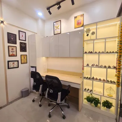 A look at the consultation area and my display of energized pyramids. This space is designed to be both functional and spiritually uplifting, creating the right atmosphere for our sessions.