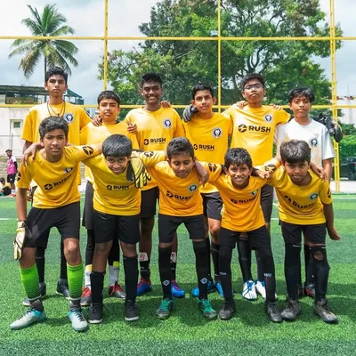 A team photo from the Inter Rush Tournament. This event is all about celebrating friendship, trust, and the shared smiles of a team that plays together.
