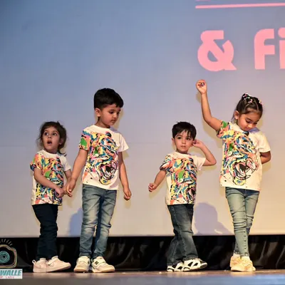 Here is our toddler group in their matching tiger-print shirts, ready for their first stage performance. I always choose fun costumes and themes to make the experience exciting for the little ones.