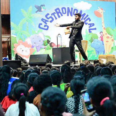 Performing on a massive stage for the 'Gastronomical' VBS 2023 event. Engaging a huge crowd of kids with big illusions and interactive magic is always an incredible experience.
