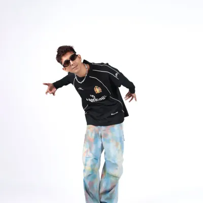 Walking like I talk it. This full-length shot captures the hip-hop attitude, with a cool pose and an outfit that's ready for the streets of Mumbai.