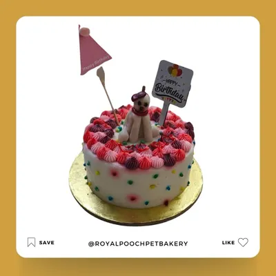 This is the custom cake I made for Coco's birthday. It features delicate frosting work and a hand-molded, edible figure of a dog on top.