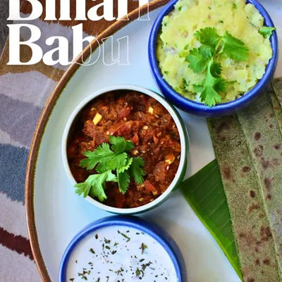A closer view of our Bihari Babu thali. The vibrant colors of the smoky baingan bharta, mustard-kissed aloo chokha, and zesty chutney promise a journey home with every bite.