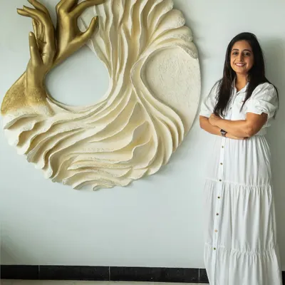 A proud moment standing beside "The Awakening Cycle" (Series 1). This 48-inch diameter piece, with its golden hands and flowing white textures, represents the beginning of a spiritual journey, where we start to embrace our own inner strength.