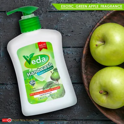 For this handwash, we created a lifestyle product shot using fresh green apples and a dark wood background to visually communicate its "Green Apple" fragrance and natural feel.