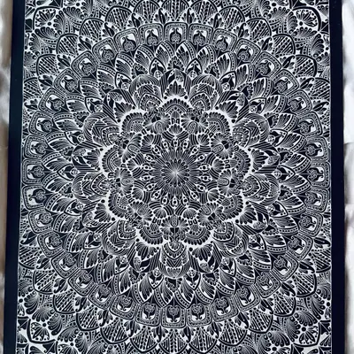 A close-up look at the details of a large, intricate piece. Every line and dot is placed with intention. This kind of detailed work is a deep form of meditation for me.