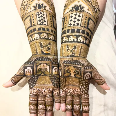 A truly royal mehendi design! I've included beautiful palace jharokhas, blooming lotuses, and a parade of tiny elephants. This is perfect for a bride who wants to feel like a queen on her wedding day.