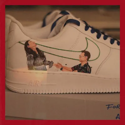 Love is in the Air. I created this custom set for a couple, painting their portraits on one pair of Nike Air Force 1s and their initials on a matching pair of Nike Blazers.