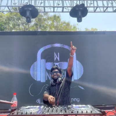 Performing at a daytime outdoor event. The vibe is different under the sun, but the goal is the same: keep the energy high and make sure everyone has a great time.