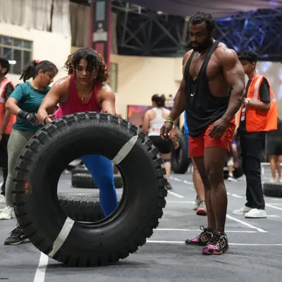 Flipping a massive tire during the Cult Unbound Championship. This event tested our functional strength and endurance, proving that our training prepares us for any challenge.