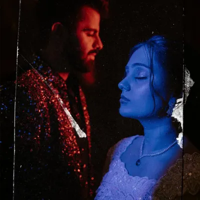 An experimental double exposure portrait using red and blue light, turning a Sangeet photo into a piece of abstract art. This is my fine art approach to wedding photography.