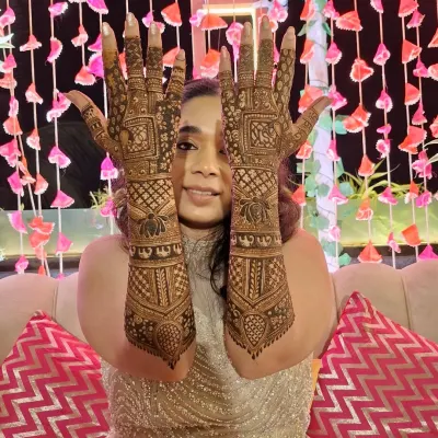 A happy bride is the best review. Here she is, glowing in her full bridal mehndi, ready for her big day.